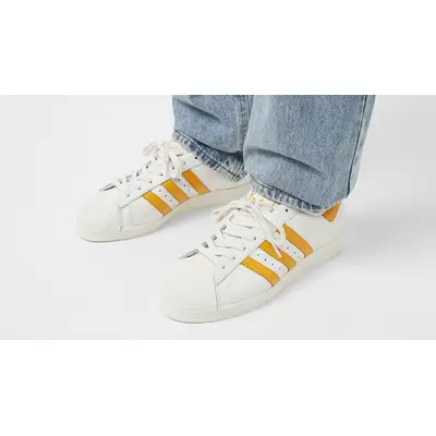 adidas Originals Superstar 82 White Yellow IF6200 on foot