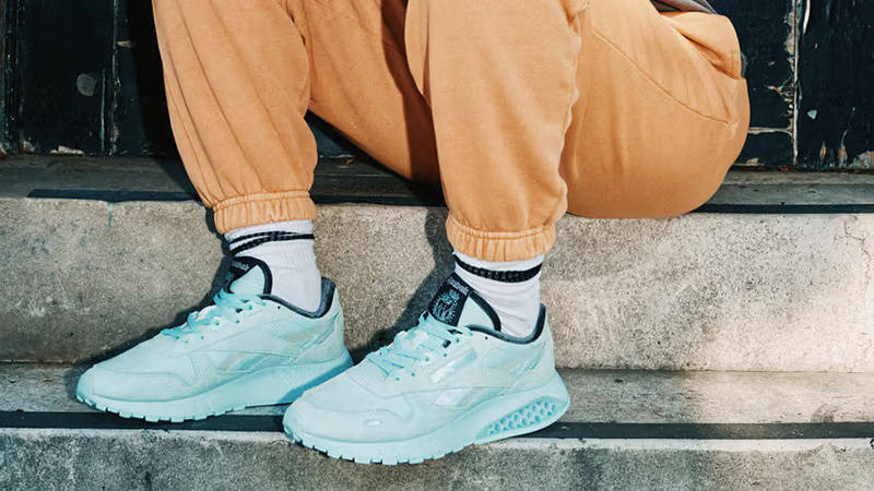 Harry Potter x Reebok Classic Leather Night Blue on foot sitting