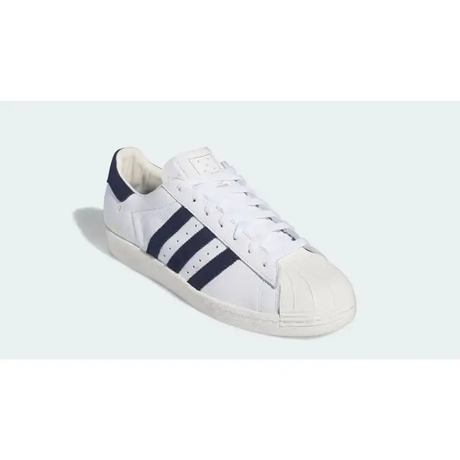 Pop Trading Company × adidas Superstar ADV White Navy front