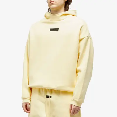Fear of God ESSENTIALS Spring Tab Detail Hoodie Garden Yellow Front