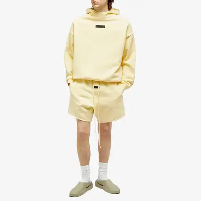Fear of God ESSENTIALS Spring Tab Detail Hoodie Garden Yellow Full Image