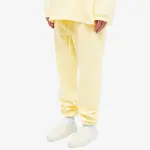 Fear of God ESSENTIALS Spring Tab Detail Sweat Pants Garden Yellow Front