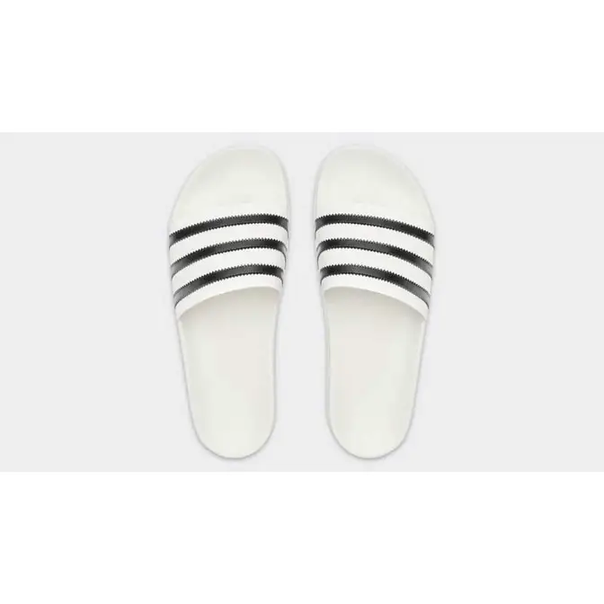 White adilette store slides