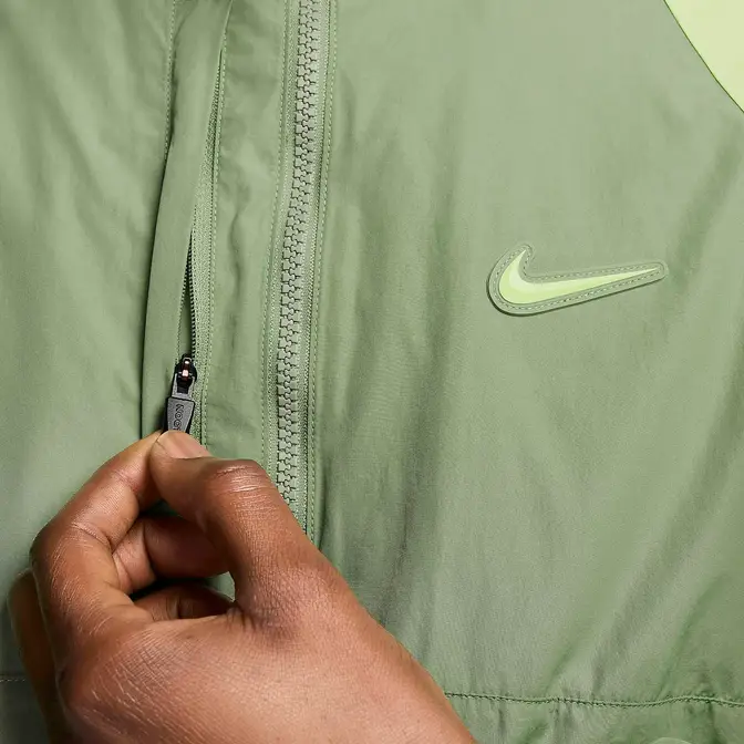 NOCTA x Nike Woven Track Jacket Oil Green Closeup Zip