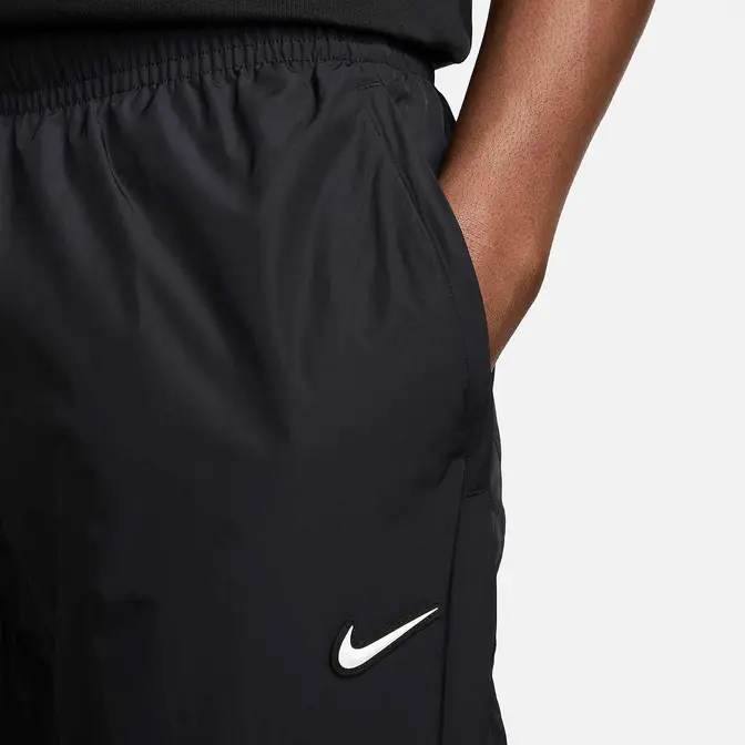 NOCTA x Nike Woven Tracksuit Bottoms Black Closeup