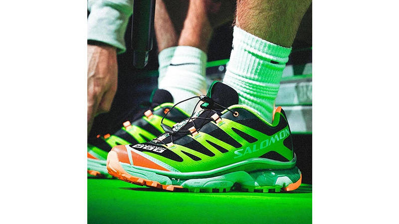 Feid x Salomon XT-4 Volt Black on foot