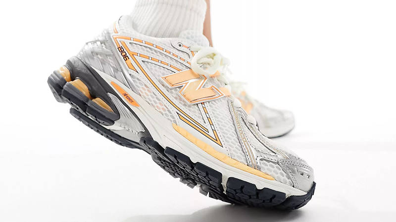 New Balance 1906 silver neon orange on foot