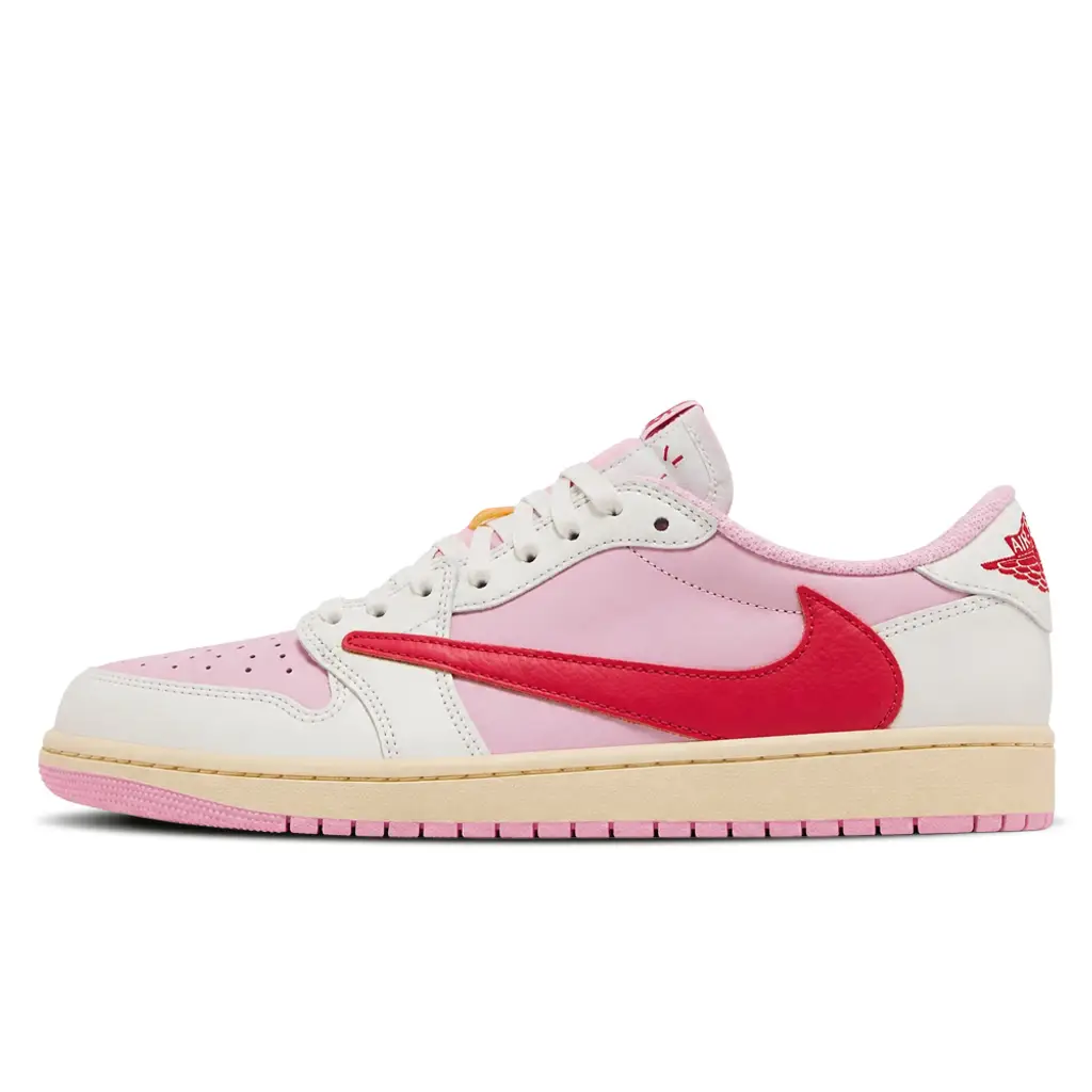 Travis Scott x Air Jordan 1 Low OG Tropical Pink lateral view showing pink nubuck upper and Sail leather overlays with Tropical Pink reverse Swoosh