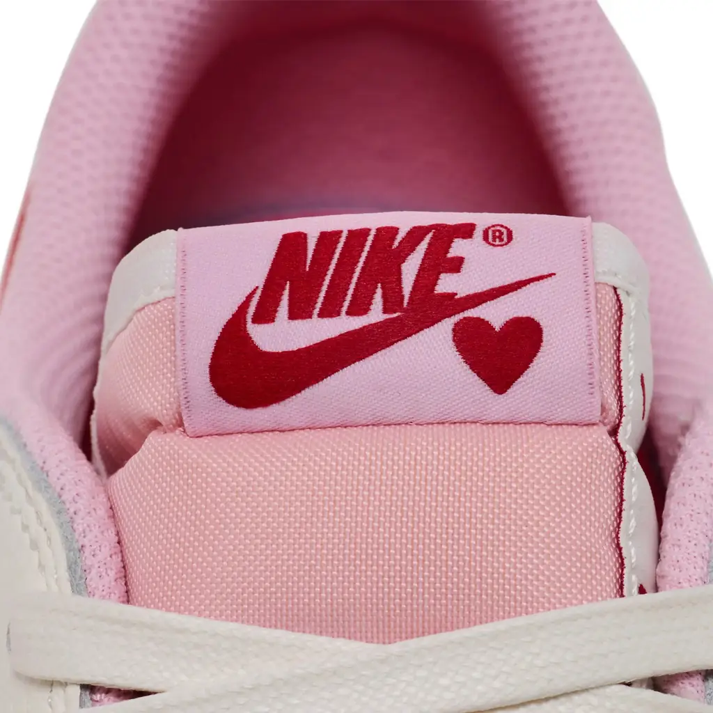 Travis Scott x Air Jordan 1 Low OG Tropical Pink tongue detail showing Cactus Jack branding and Nike Air label