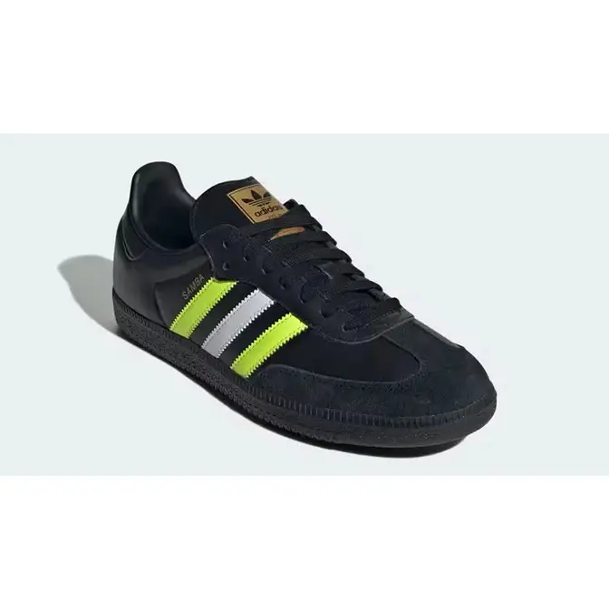 Black and yellow adidas samba best sale