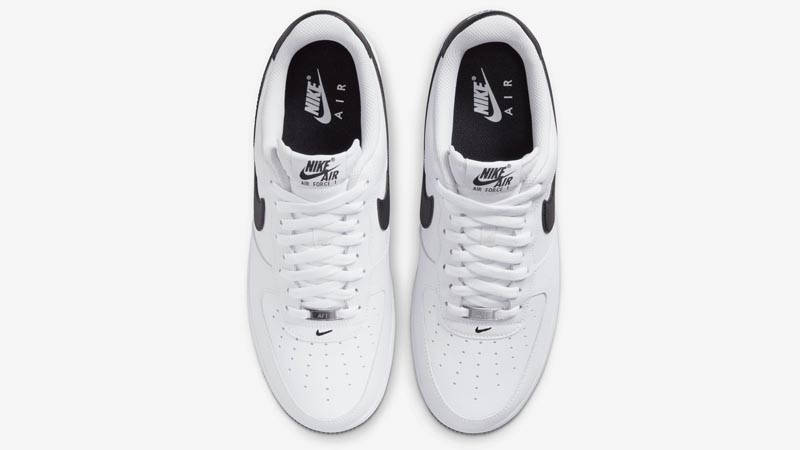 white nikes with black soles