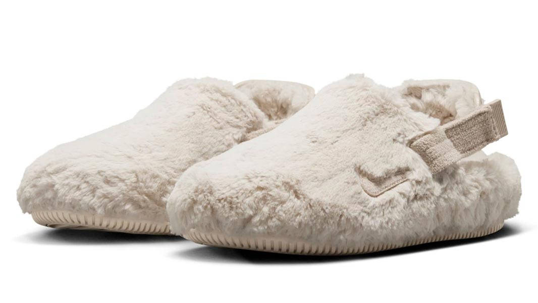 Nike fuzzy slides hotsell