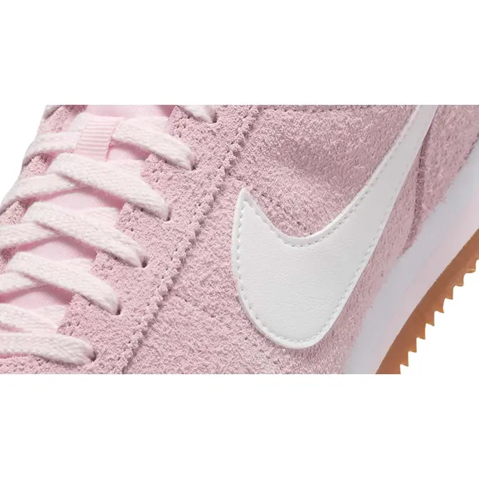 Pink suede nike cortez hot sale