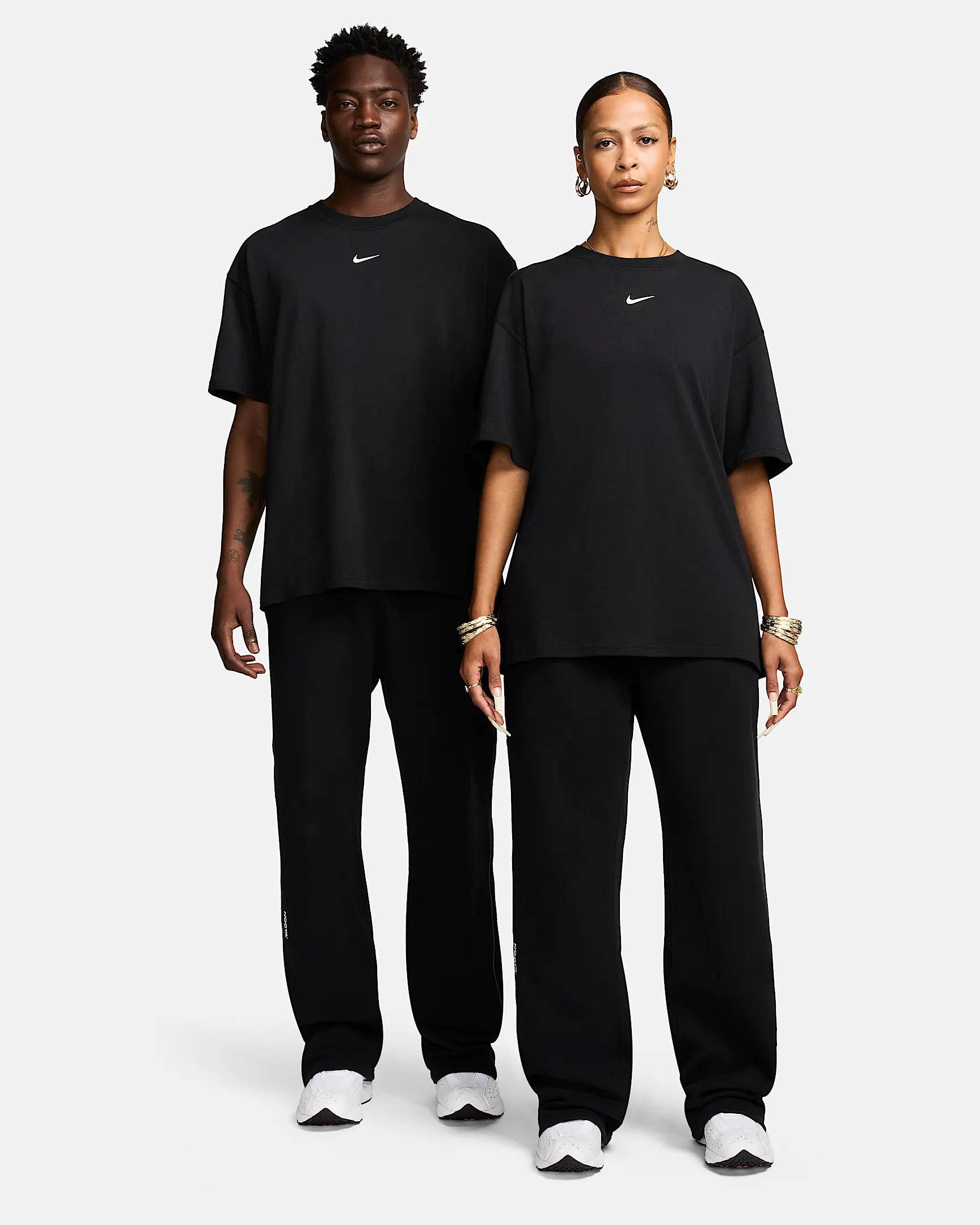 NOCTA Fleece CS Open-Hem Tracksuit Bottoms FZ4675-010 Black Full Front View