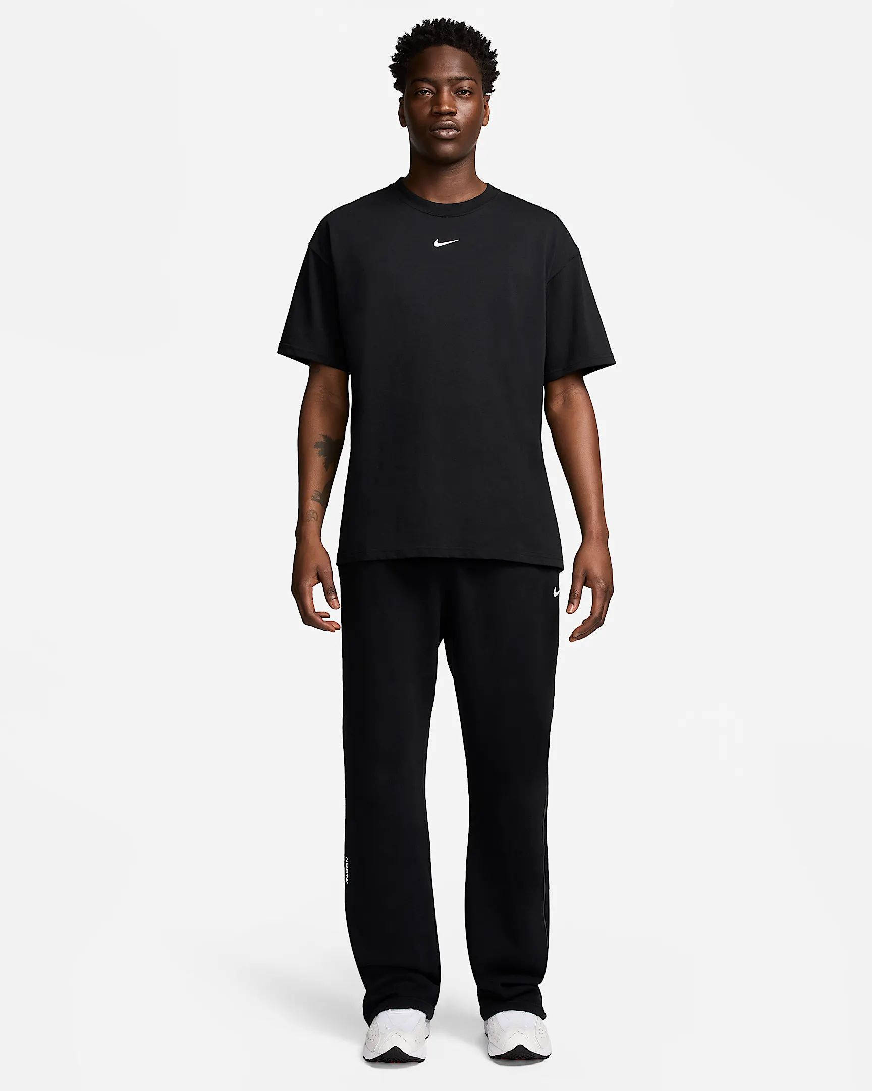 NOCTA Fleece CS Open-Hem Tracksuit Bottoms FZ4675-010 Black Full Front