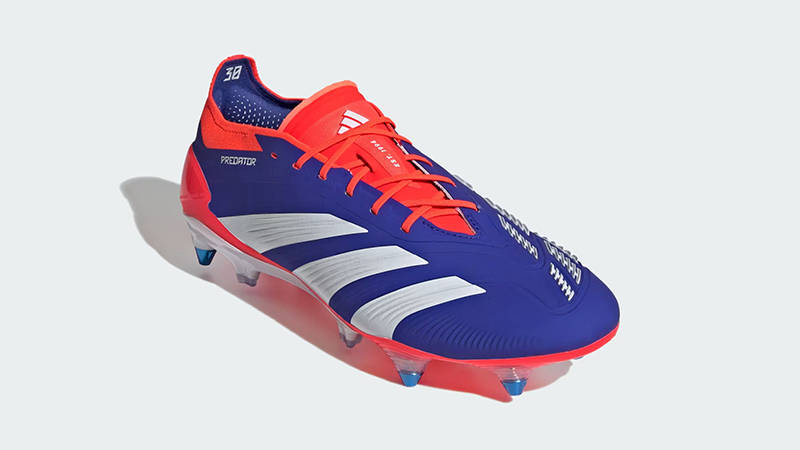 red and blue adidas boots