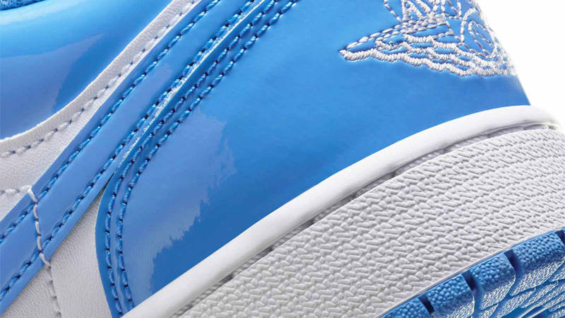 black and blue patent leather jordans