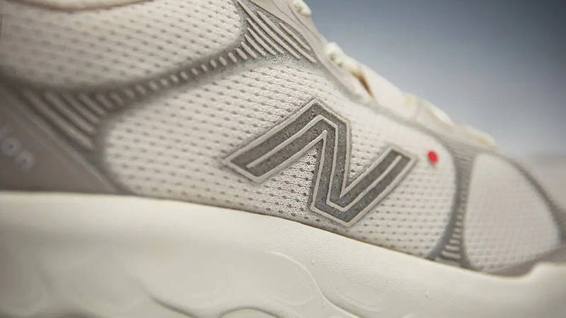 District Vision x New Balance Trail White logo