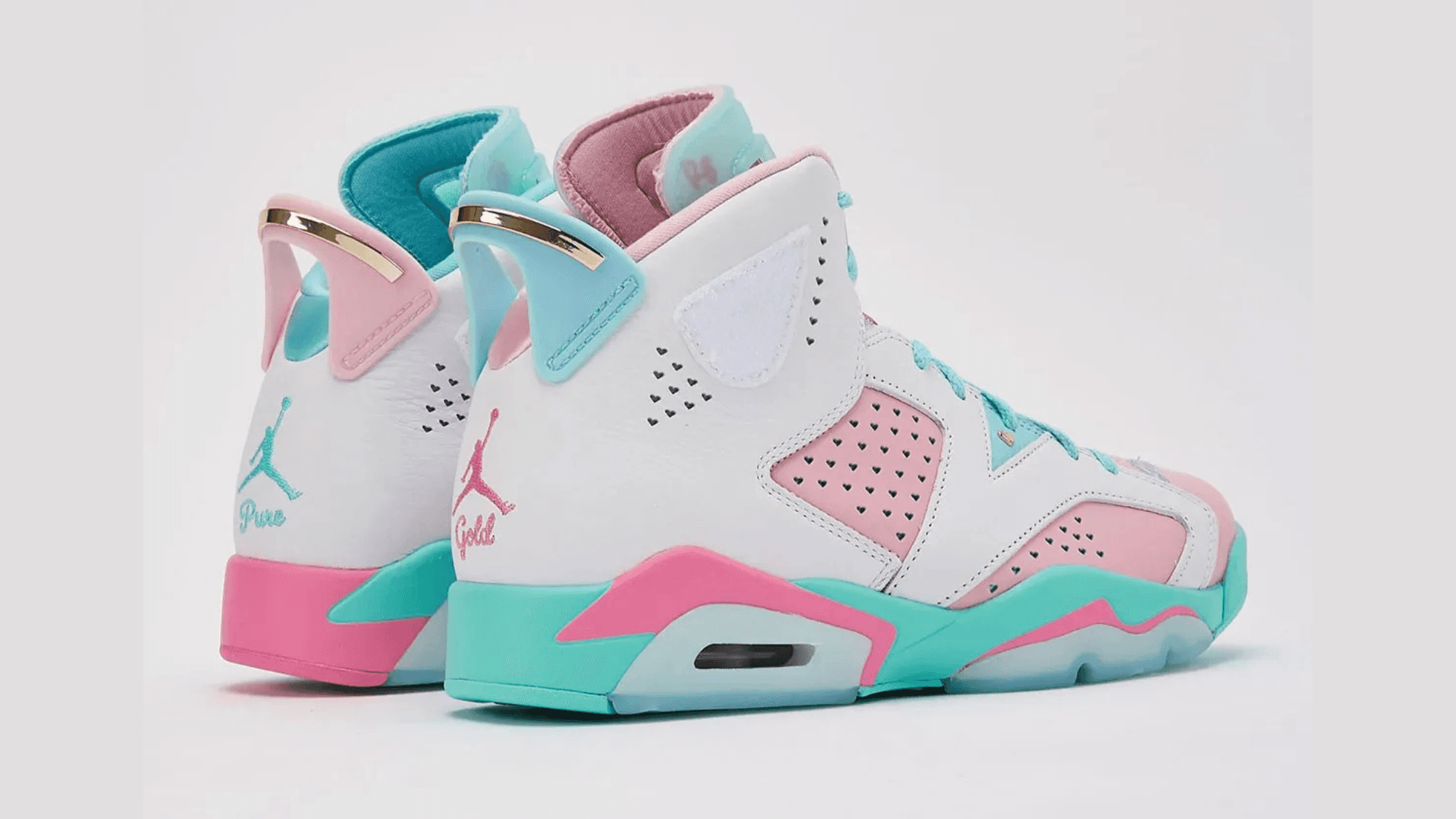 pink and blue jordans 6