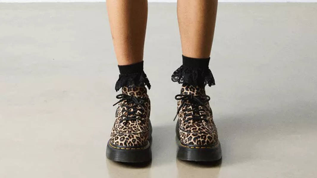 Dr. Martens Buzz 5-Eye Leopard 41011200 on feet