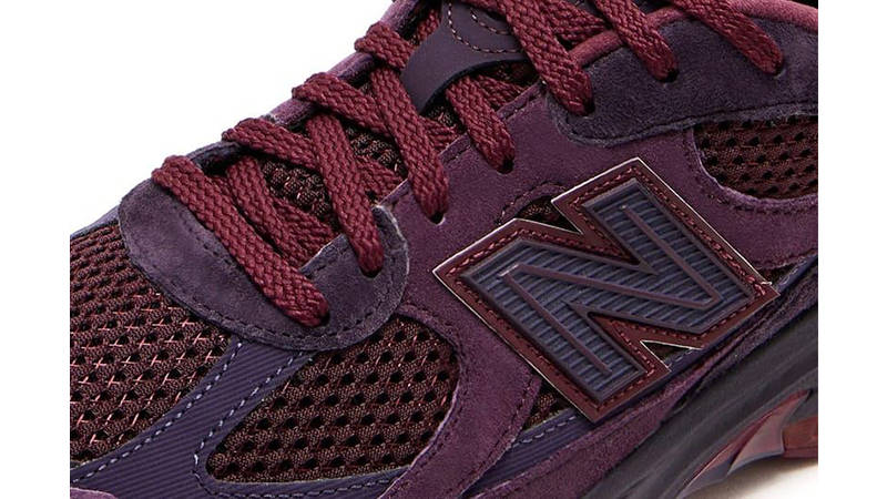Rich Paul New Balance 2010 Dark Vintage Rose Angora logo