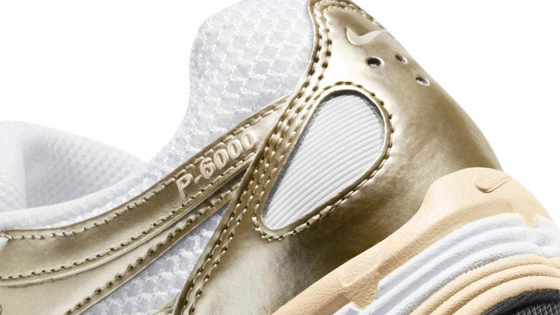 Nike P-6000 Metallic Gold Grain Closeup