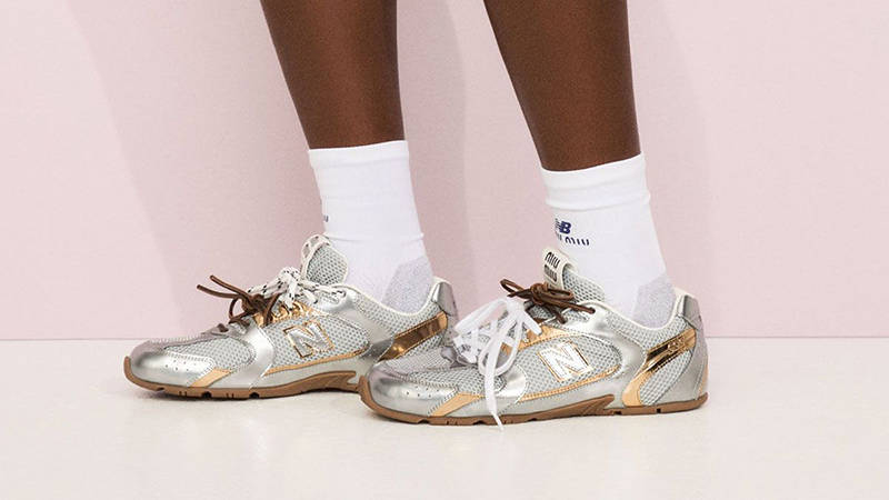 Miu Miu x New Balance 530 SL Metallic Silver Gold on foot