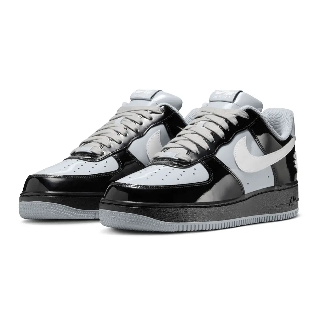 Central Cee x Nike Air Force 1 Low Black Smoke Grey front view showing black and grey upper and pale swoosh