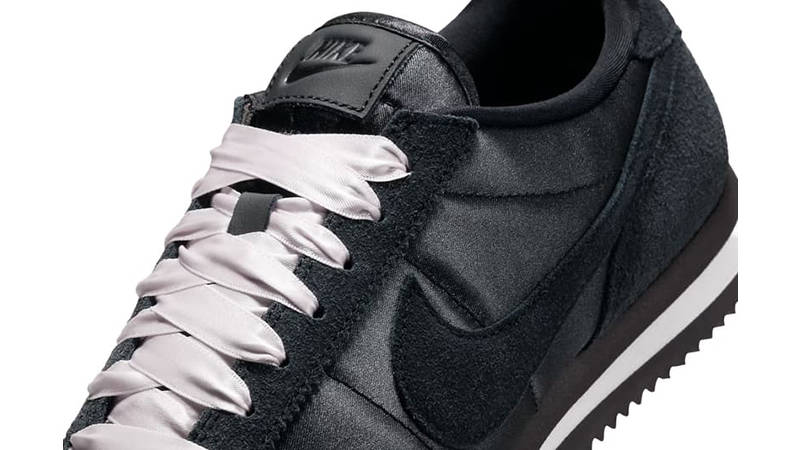 black and pink nike cortez