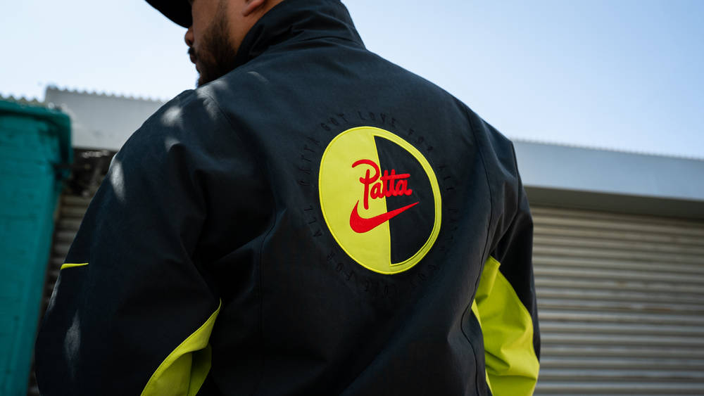 Patta x Nike 2025 apparel collection Nike Team jacket shot from rear