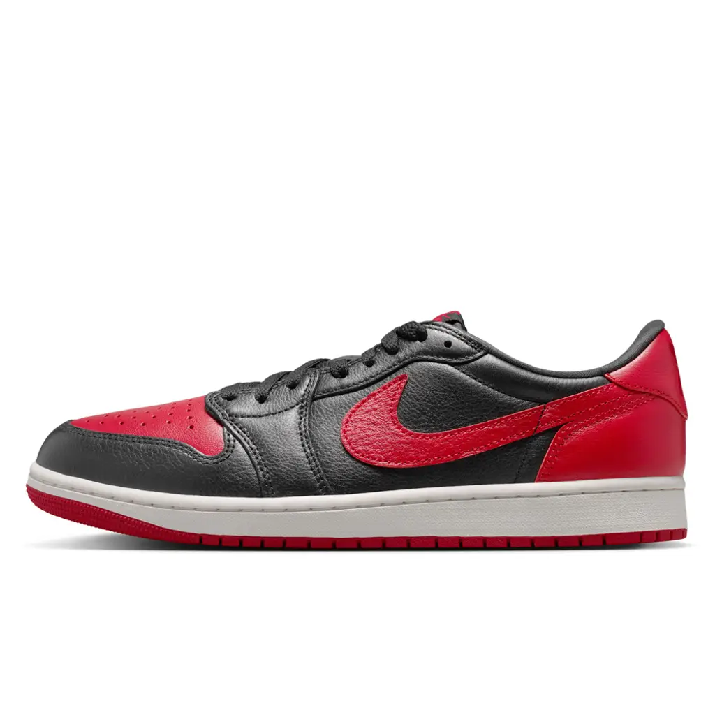 Air Jordan 1 Low OG Banned lateral view showing black premium leather upper with Varsity Red enlarged Swoosh