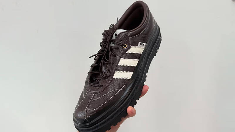 Song For The Mute x adidas Samba LX Freizeit Brown on hand