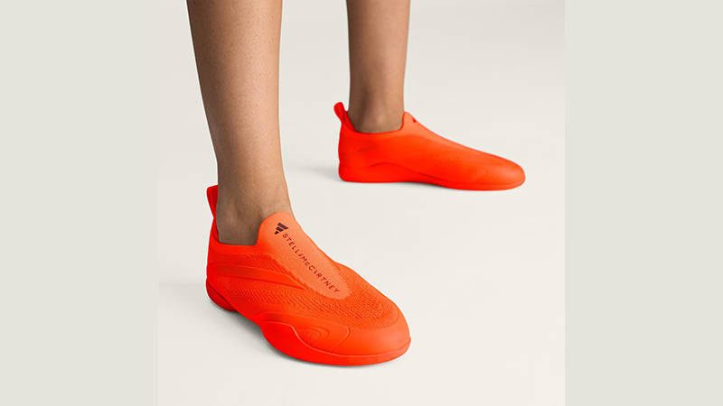 Stella McCartney x adidas Taekwondo Orange JQ2978 on foot feature
