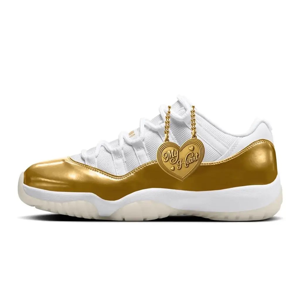 Air Jordan 11 Low Mother's Day AH7860-102 hero image showing white ballistic mesh upper with metallic gold patent leather mudguard