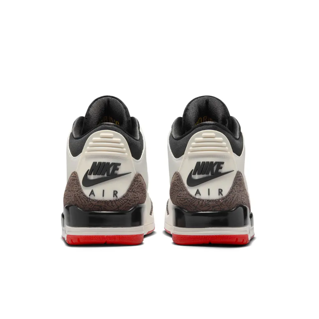 Air Jordan 3 World's Best Dad heel detail showing Nike Air TPU tab carpet jacquard heel overlay and translucent red Bred outsole