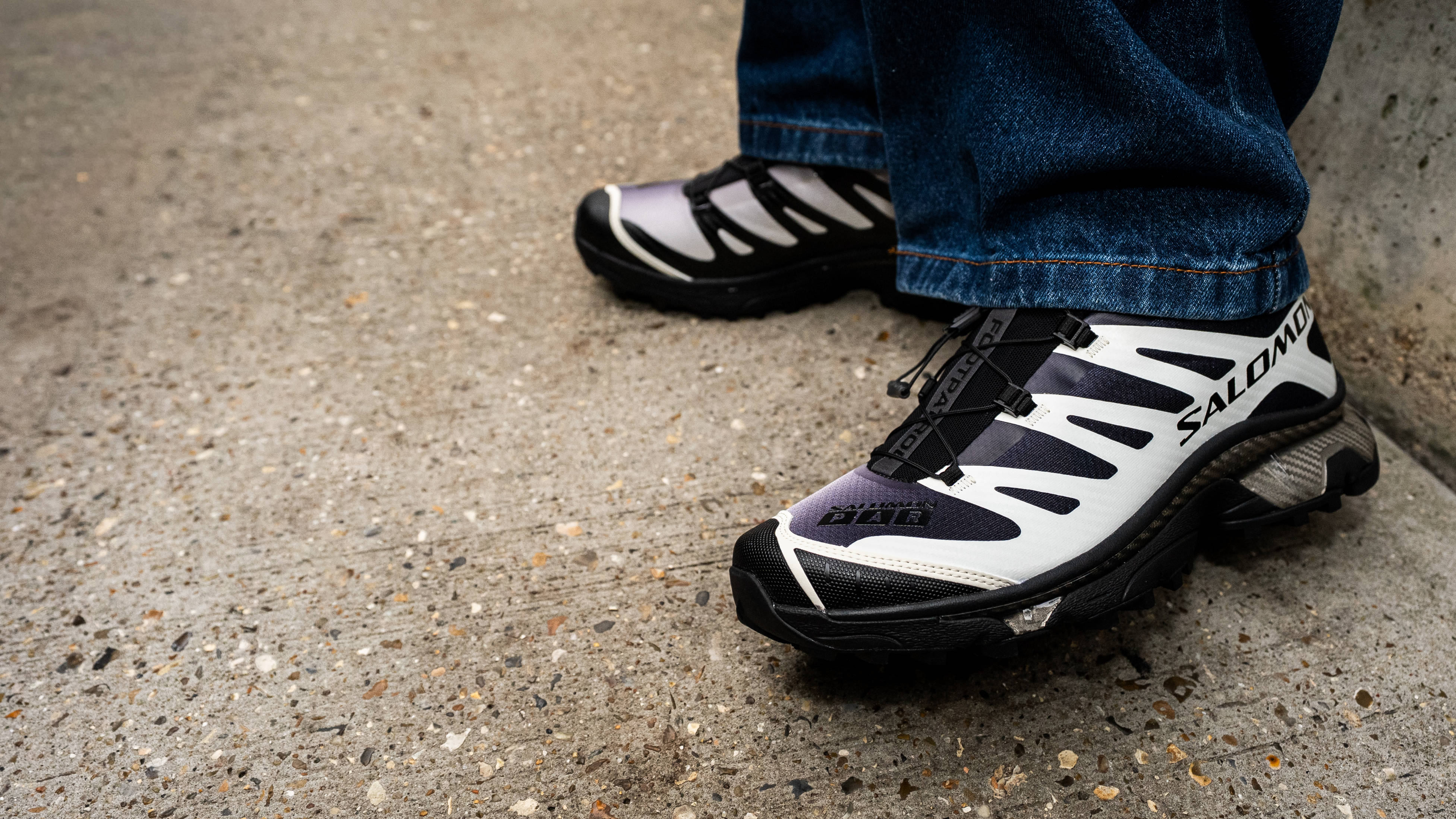 Footpatrol x Salomon XT-4 Black Vanilla Ice on-feet with baggy denim