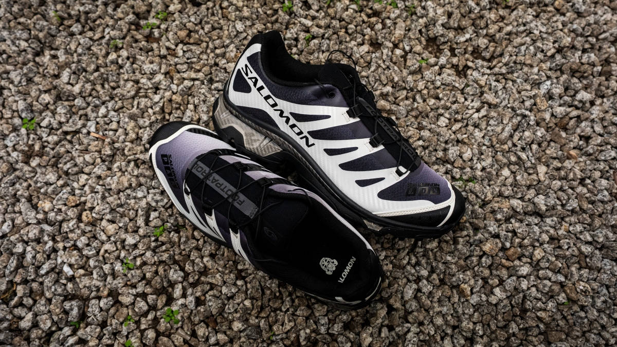 Footpatrol x Salomon XT-4 Black Vanilla Ice against gravel stone urbanscape background