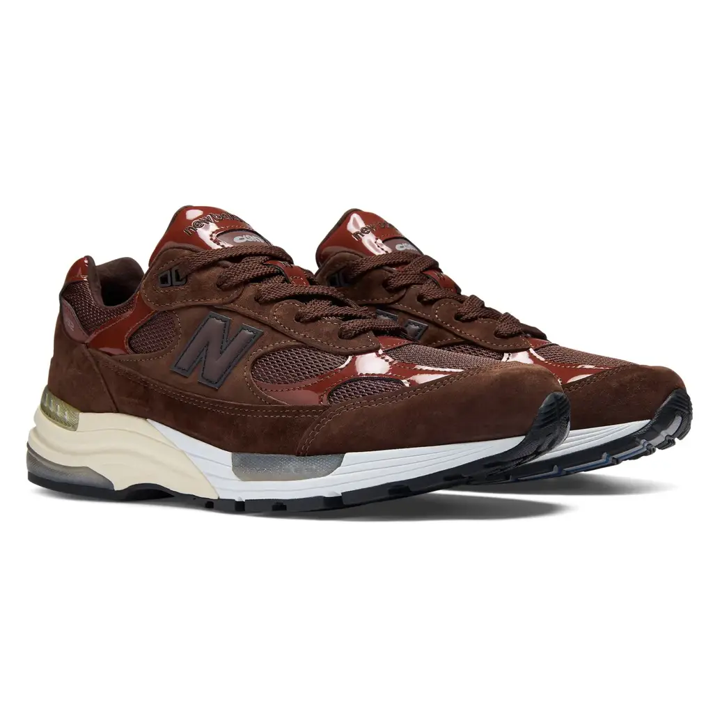 Aminé x New Balance 992 Outdoor School U992NE hero image showing chocolate brown mesh suede and glossy patent leather upper with Outdoor School detailing