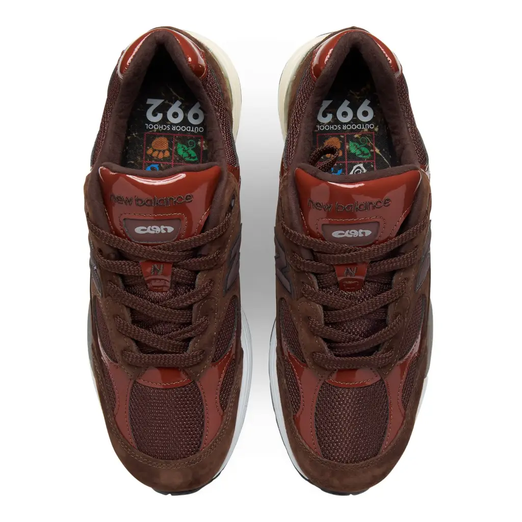 Aminé x New Balance 992 Outdoor School detail showing Club Banana tongue branding and Aminé heel signature