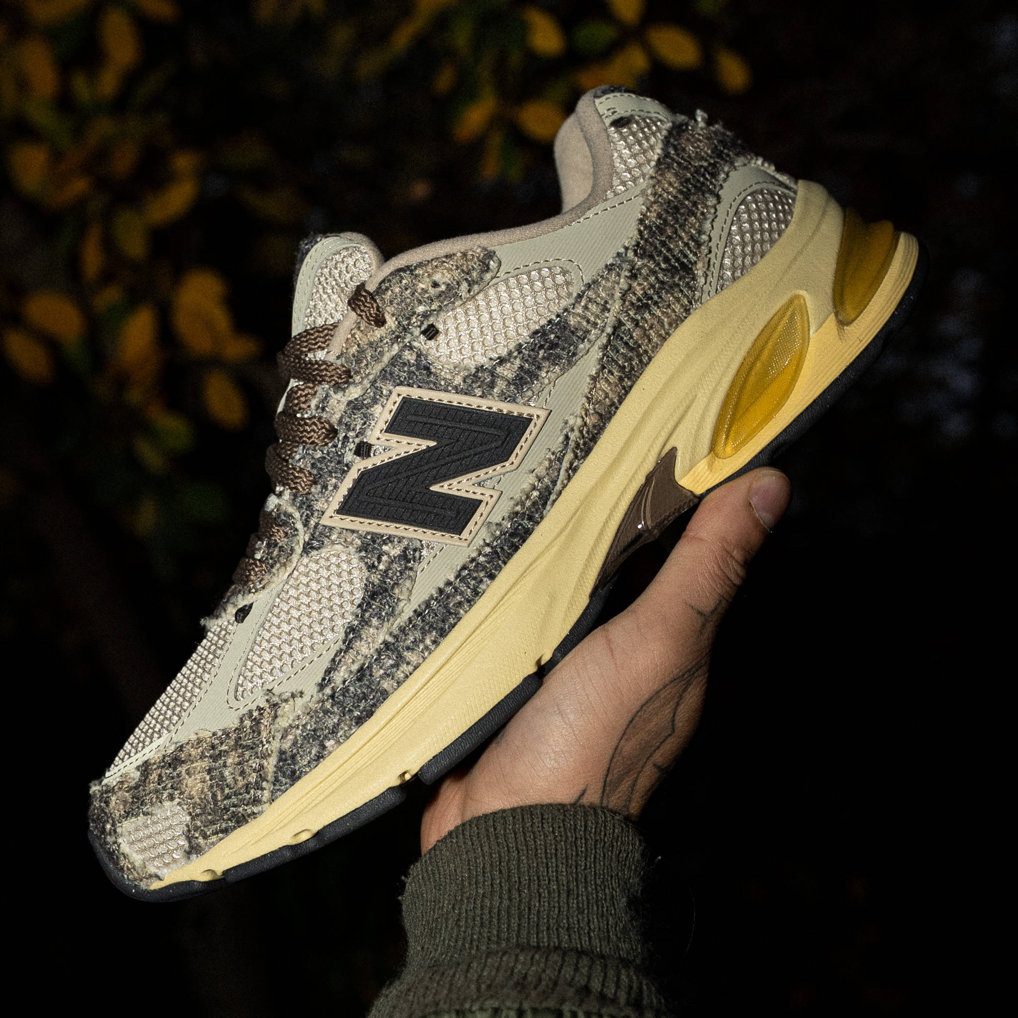 Joe Freshgoods x New Balance 2010 Bag Lady in hand during night