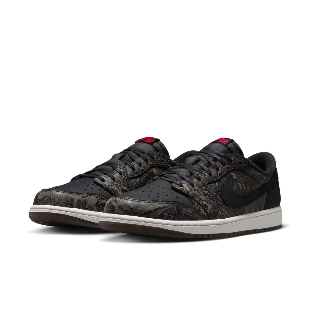 Air Jordan 1 Low OG Laser IV6750-001 hero image showing black nubuck panels laser-etched leather sides and Fire Red Wings logo detailing