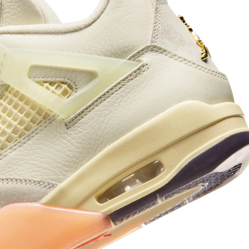 Air Jordan 4 Birds of Paradise outsole detail showing semi-translucent Bright Mango and Sundial tropical sole