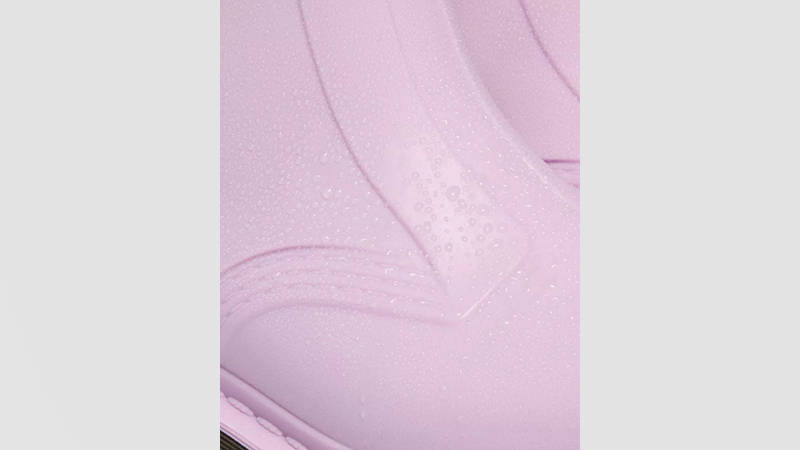 Dr Martens 1460 Rain Boots Lilac 41250500 with water