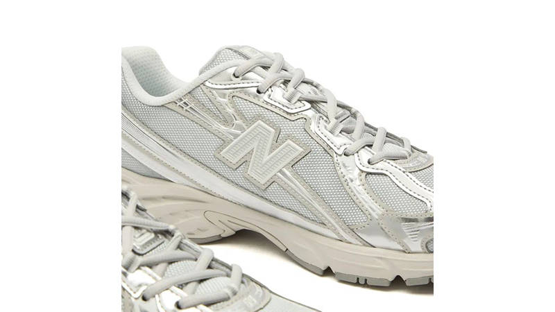 New Balance 740 Metallic Silver U7405I7 logo