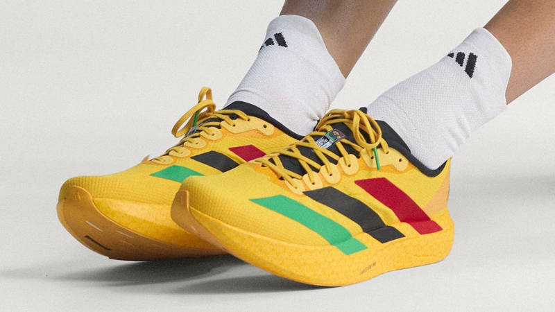 Bob Marley x adidas EVO SL Yellow Multi KJ3625 on foot side