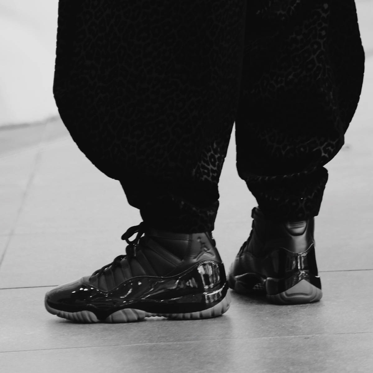Comme des Garçons x Air Jordan 11 Black On Feet 2