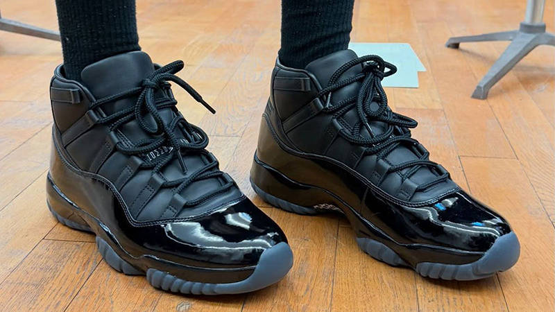 Comme des Garçons x Air Jordan 11 Black on foot