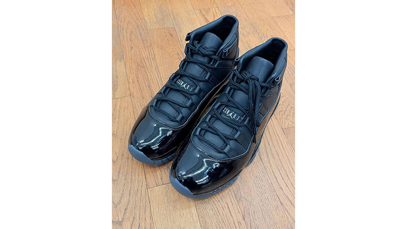 Comme des Garçons x Air Jordan 11 Black side