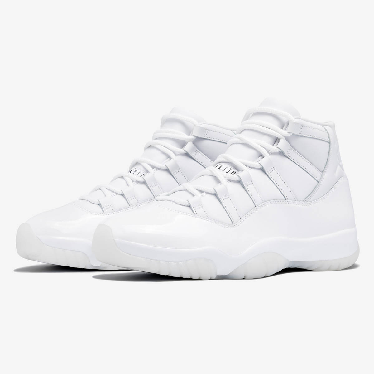 Comme des Garçons x Air Jordan 11 White Pair