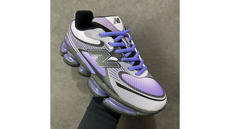New Balance Abzorb 2000 Taro Electric Indigo U200087T logo